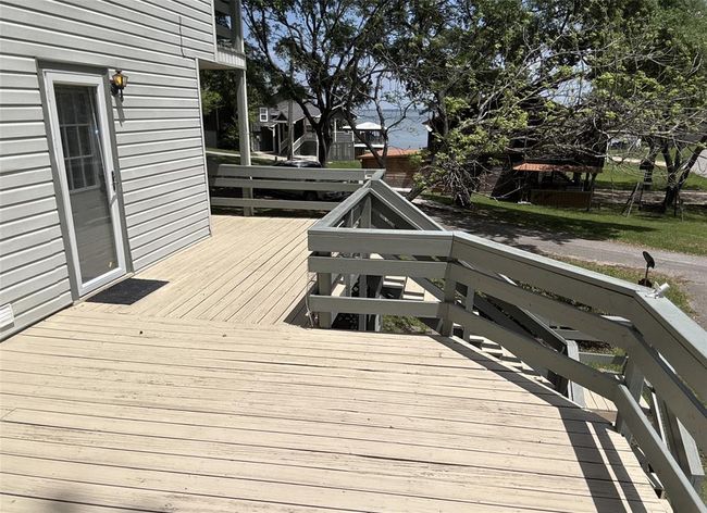 Enjoy stunning Lake Livingston views from this spacious porch! | Image 21