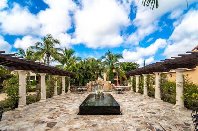 View of swimming pool featuring a patio area | Image 25