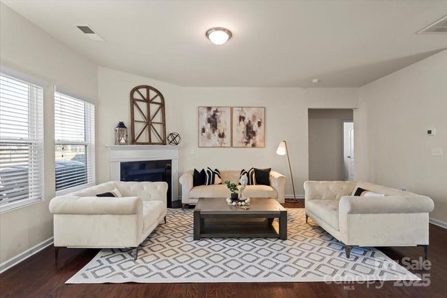Open living area with fireplace | Image 4