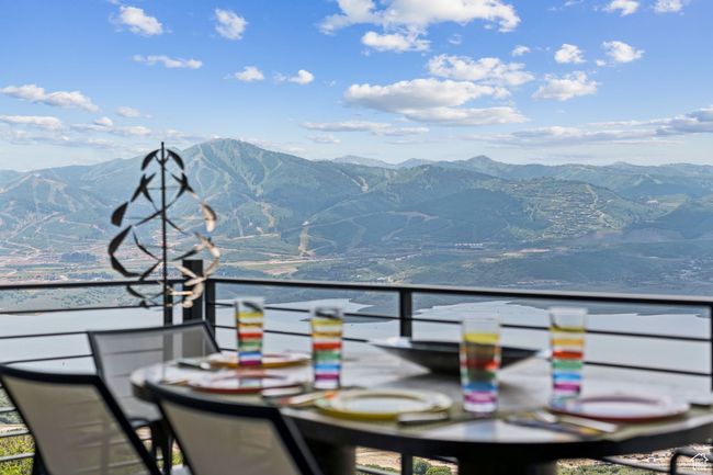 Balcony featuring a mountain view | Image 77