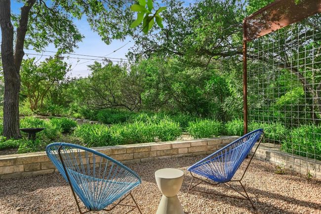 Front yard seating area with custom steel trellis | Image 4