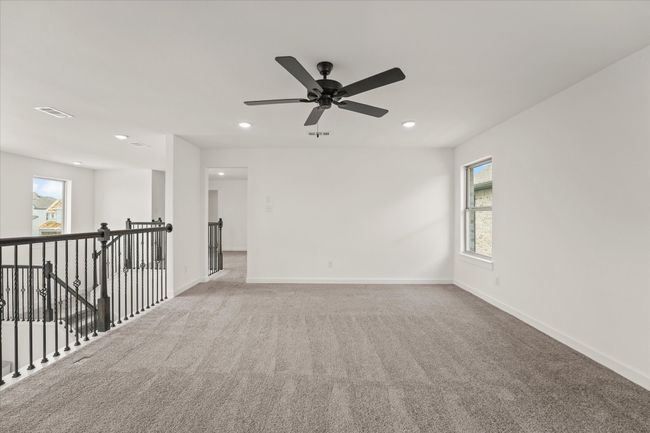 Carpeted spare room with recessed lighting and a ceiling fan | Image 33