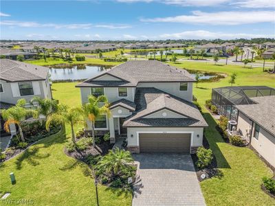 14604 Monrovia Lane, House other with 4 bedrooms, 3 bathrooms and null parking in Fort Myers FL | Image 1