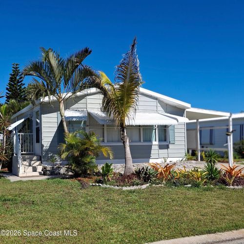 916 Jacaranda Dr, Barefoot Bay, FL, 32976-7106 | Card Image