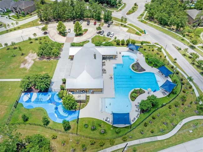 One of the community pools with splash pad, gym, clubhouse and playground. | Image 44