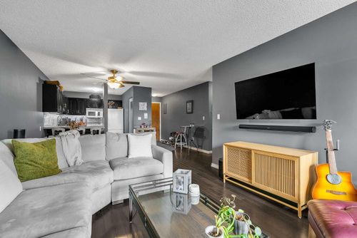305-1001 68 Ave Sw, Calgary, AB, T2V4X1 | Card Image