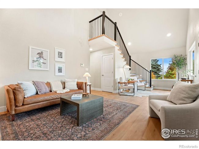 Living room with vaulted ceilings | Image 5