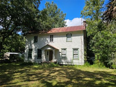 45134 Booth Street, Home with 4 bedrooms, 2 bathrooms and null parking in Callahan FL | Image 2