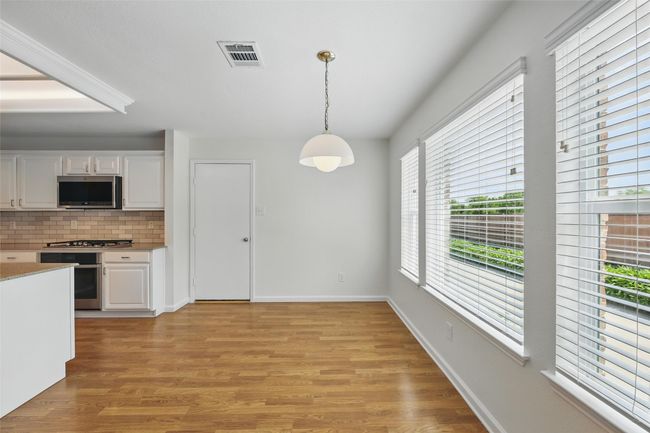 The amount of natural light through-out the home is showcased with the light paint choice. | Image 16