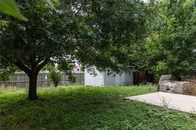 View of yard featuring a storage shed | Image 25