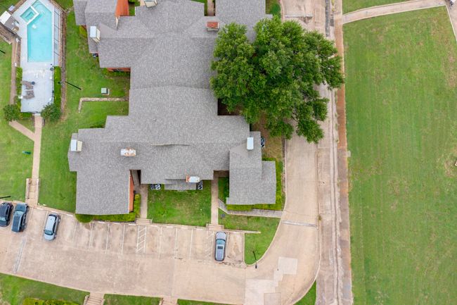 Aerial view of property and surrounding area with a pool area | Image 10