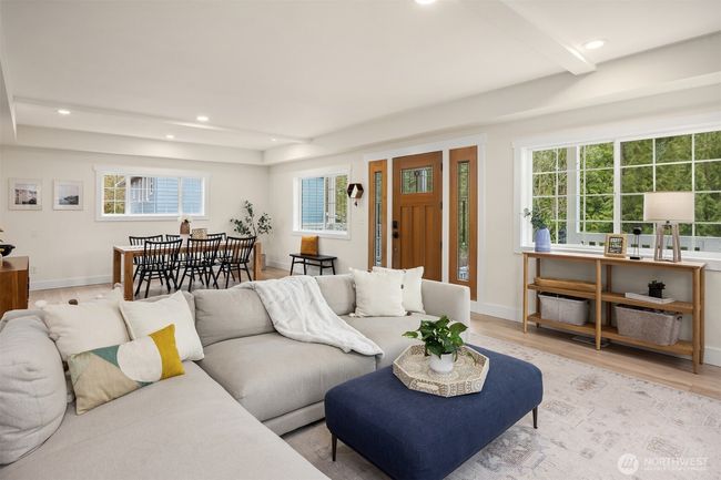 The living room connects to the generous dining area. | Image 8