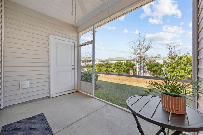 Unfurnished sunroom featuring ceiling fan | Image 27