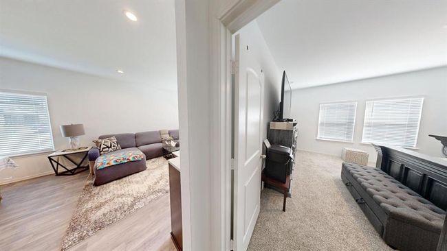 Strategically located at the back of the house, the master bedroom is near the living room and the kitchen | Image 22