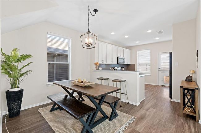 Breakfast/dinning room open to the living and kitchen. | Image 7