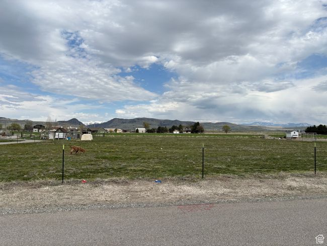 View of yard featuring a mountain view and a rural view | Image 11