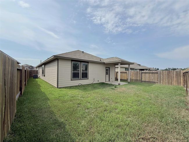 14501 SUGAR PINES DR - Fully fenced back yard | Image 44
