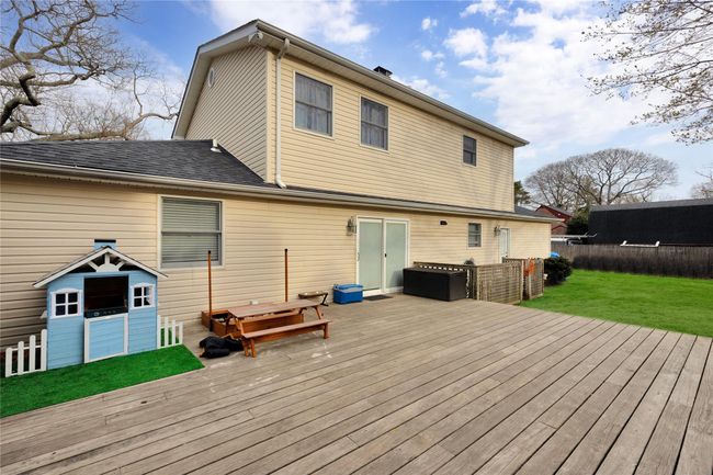 Wooden deck featuring a yard and fence | Image 23