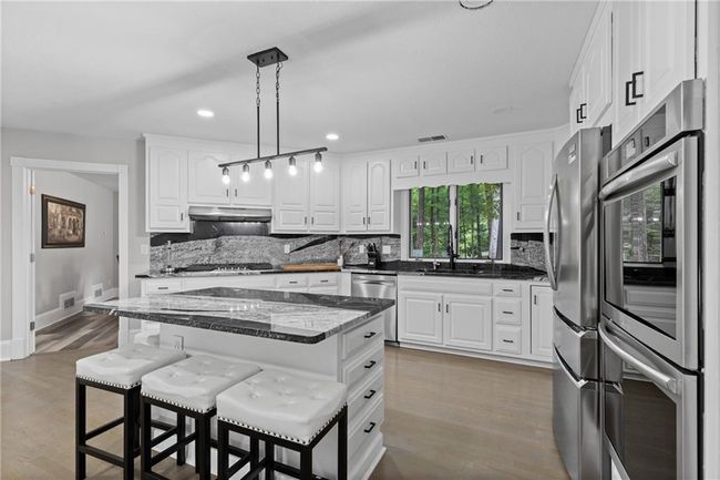 630 Buttercup Trce, House other with 7 bedrooms, 5 bathrooms and null parking in Alpharetta GA | Image 27
