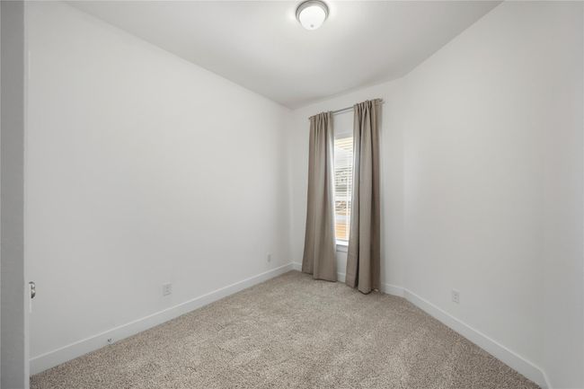 Bedroom 3 offers flexibility to fit your lifestyle, perfect as a cozy guest room, nursery, or creative workspace with plenty of natural light. | Image 25