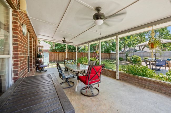Enjoy this large outdoor covered space with your morning cup of coffee or after dinner cocktail. You will enjoy this space year around and provides the perfect perch to escape the summer sun or respite from the chilly winter winds while still getting some much needed fresh air! | Image 15