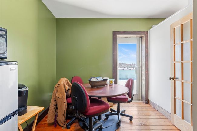 Office area with light hardwood / wood-style flooring | Image 18