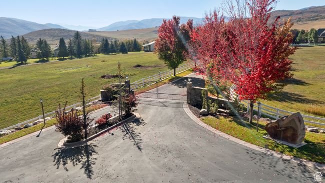 View of mountain backdrop with rural landscape and agricultural land | Image 16