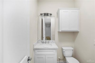 Bathroom featuring vanity and toilet | Image 3