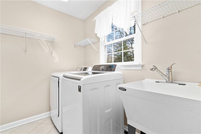 laundry/mud room between garage and​​‌​​​​‌​​‌‌​‌‌​​​‌‌​​‌‌​‌​​​​​‌ kitchen | Image 12