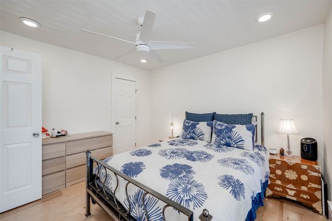 Bedroom featuring recessed lighting, light wood finished floors, and a ceiling fan | Image 13