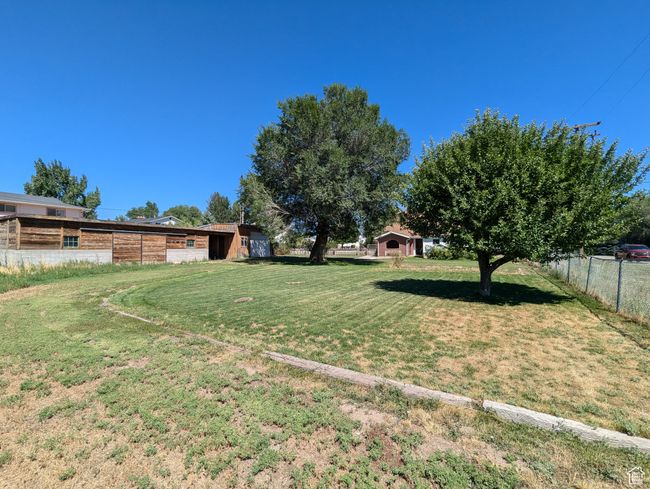 View of yard featuring fence | Image 33