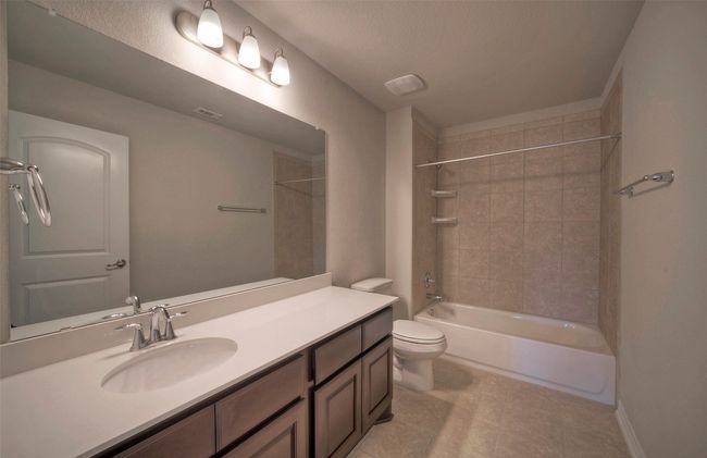 Full bathroom with toilet, vanity, shower / washtub combination, and visible vents | Image 21