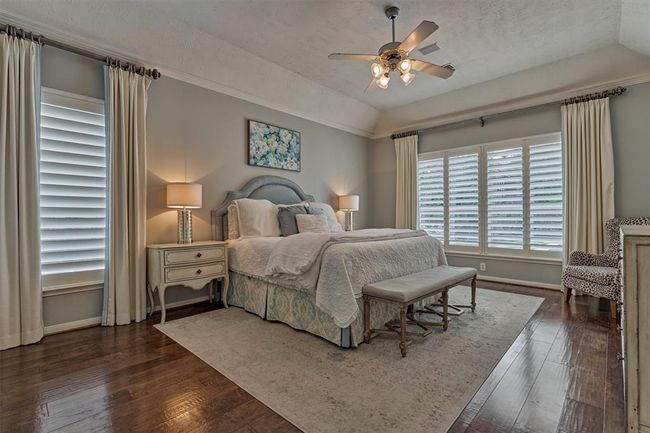 Primary Bedroom (1st floor) - a true place of respite. Sloped ceilings add to the luxurious feel. | Image 25