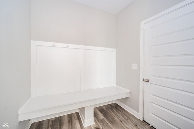 Cubby area at the entrance of the home from the garage | Image 15