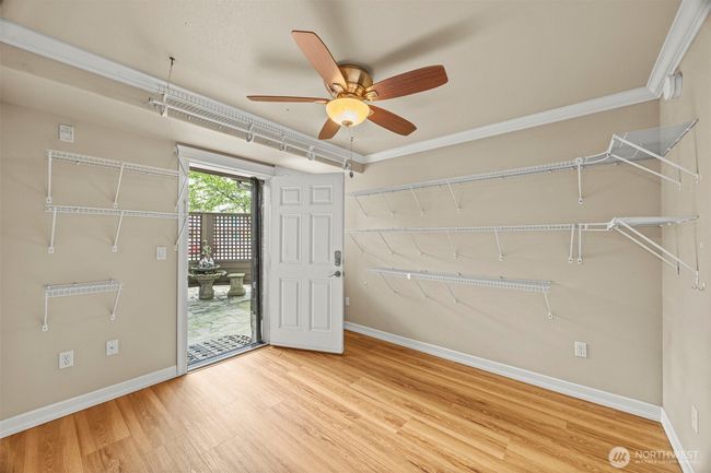 Third bedroom with door to courtyard. Previously used as sewing room. | Image 22
