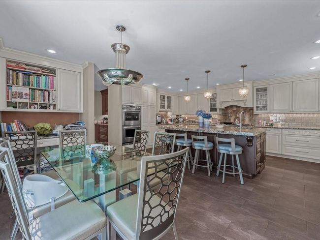 Dining room with recessed lighting | Image 11