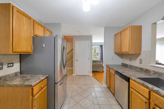 1A - 675 Fieldcrest Dr, Condo with 3 bedrooms, 3 bathrooms and 2 parking in South Elgin IL | Image 5