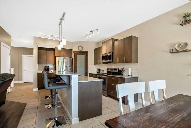 5 Drake Landing Loop, House detached with 3 bedrooms, 2 bathrooms and 5 parking in Okotoks AB | Image 7