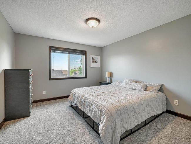 This is the third bedroom at a different angle with different bedding for spring | Image 25