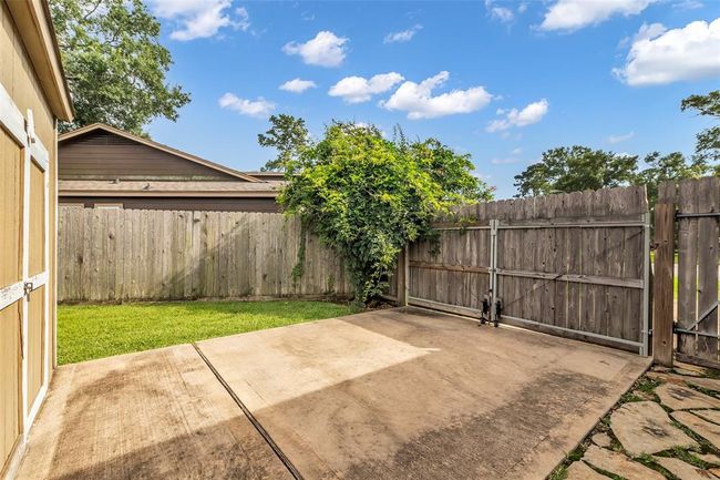 Side yard with room for extra parking. | Image 36