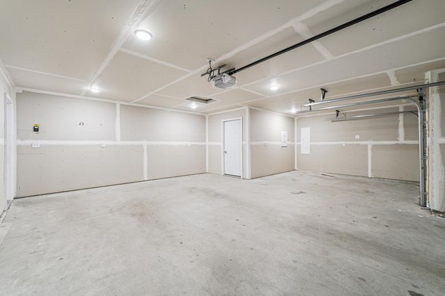 Garage is insulated. 3-stalls, 3rd could fit a small car or used for storage. | Image 26