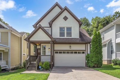 This craftsman (NOT a detached HPR) sits on .14 acres with great curb appeal, a pet friendly backyard and is the ONLY home on the block w/2 car garage--we're EV-charger ready for the eco-friendly. | Image 3