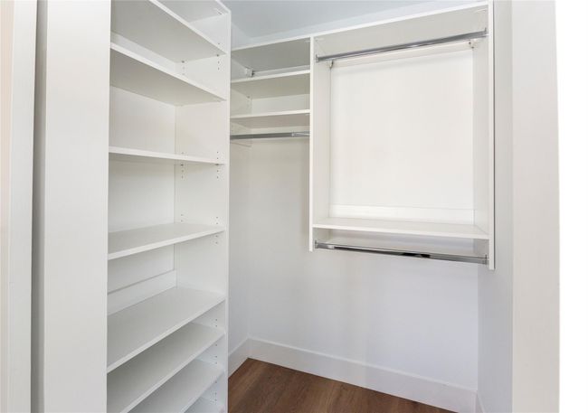 All bedroom and hallway closets have custom closet organizers. | Image 32