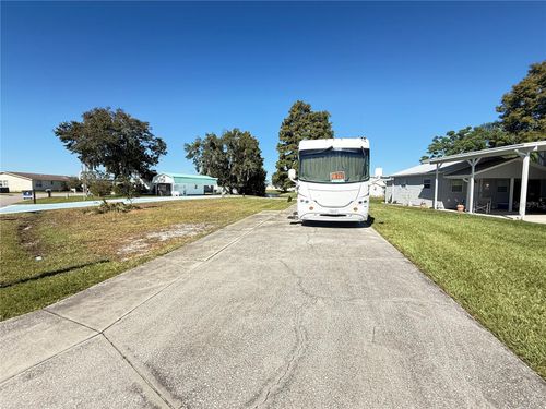 5058 Shore Line Dr, POLK CITY, FL, 33868-9658 | Card Image