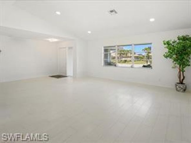 Unfurnished room featuring hardwood / wood-style floors | Image 8