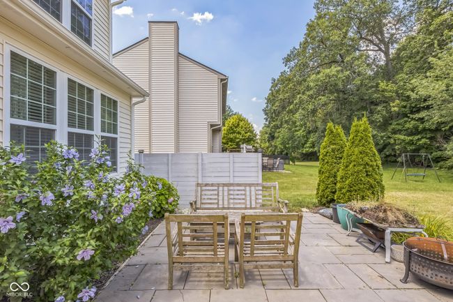 view of patio with a fire pit | Image 34