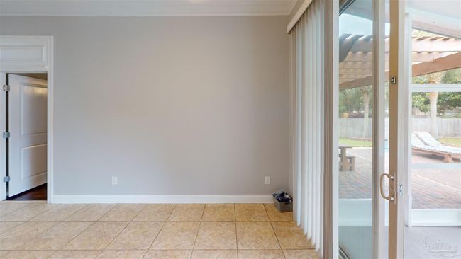 7445 Brevard St, House other with 4 bedrooms, 3 bathrooms and 6 parking in Navarre FL | Image 9