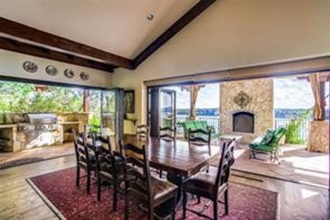 Dining Room surrounded by NanaWall doors opening to the massive patio | Image 16