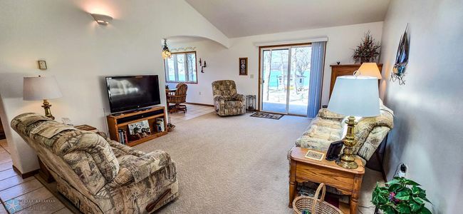 Living/Family Room with Patio Access to Lake Views! | Image 23