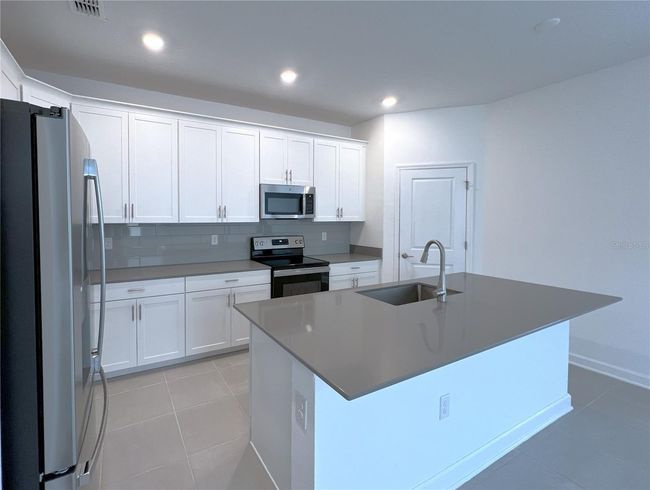 4048 Redbridge Loop, House other with 4 bedrooms, 3 bathrooms and null parking in DAVENPORT FL | Image 10